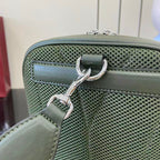 Gucci bag clasp with green mesh panel and silver-tone hardware, top close-up