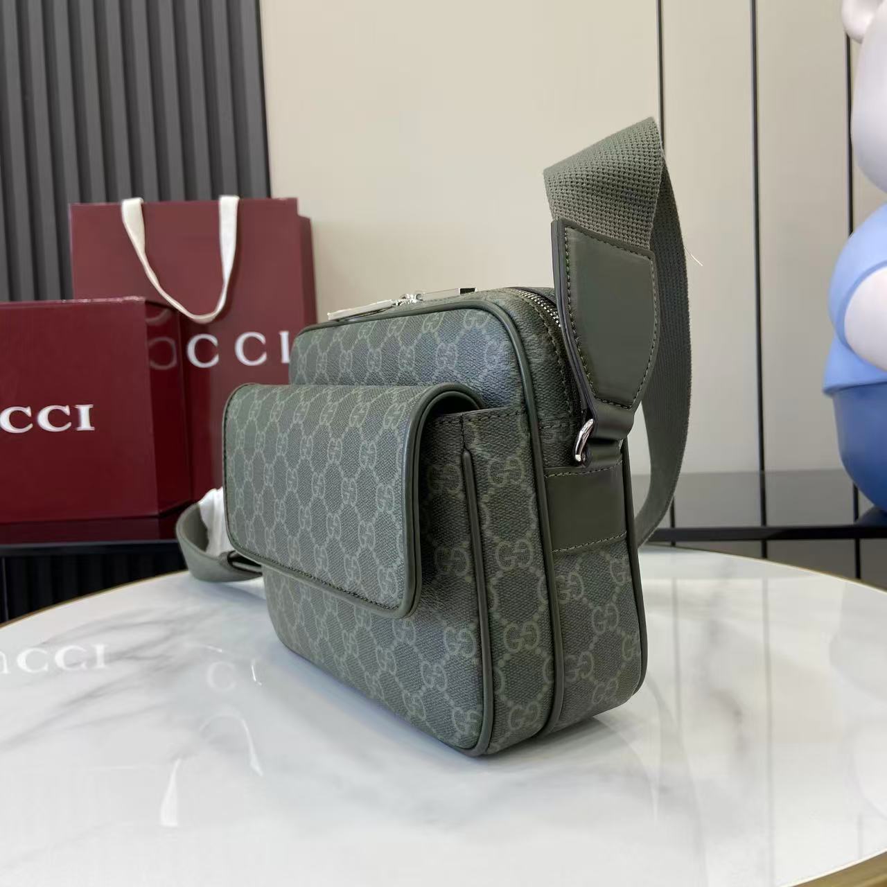 Monogram crossbody bag in dark green with GG pattern, back panel and strap