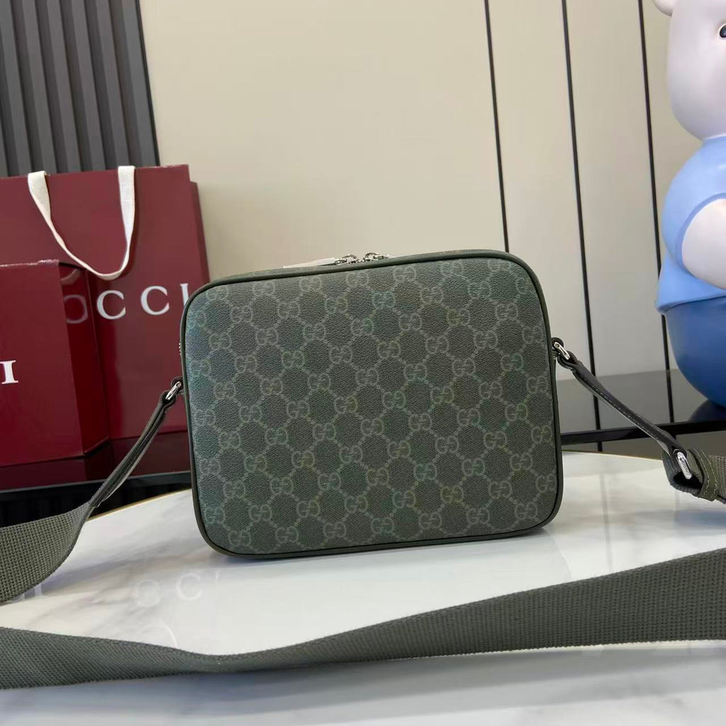 Monogram crossbody bag in dark green with GG pattern and long adjustable strap