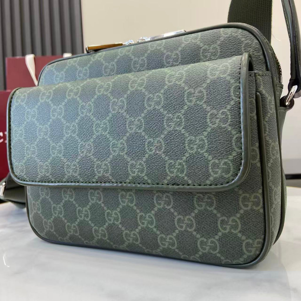 Monogram flap crossbody bag in dark green with GG pattern and curved front flap