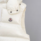 White padded jacket with Moncler logo patch and snap button placket