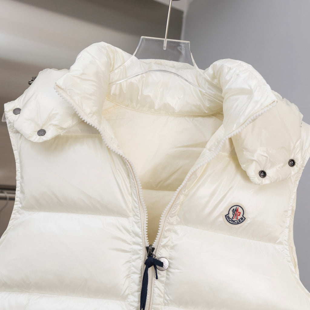 White hooded padded jacket with flap pockets and snap buttons