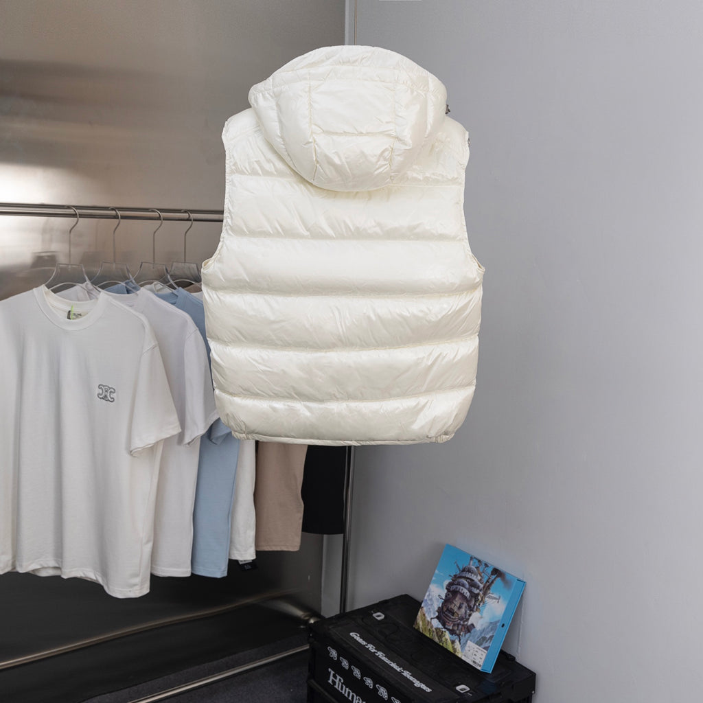 White hooded padded jacket vest with full back quilting and raised hood