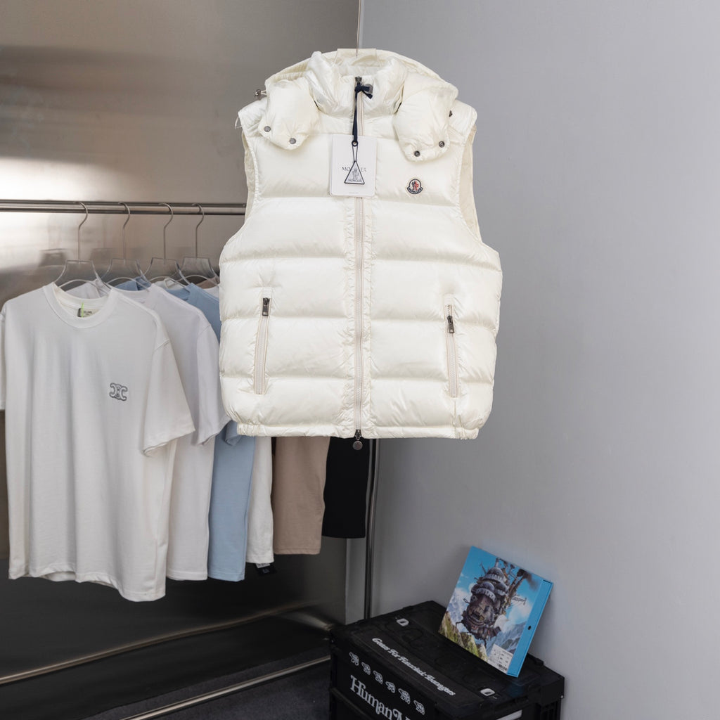 White hooded padded jacket vest with front zipper and snap button details