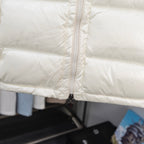 Long padded jacket, off-white with front zipper and stitched quilting