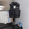 Moncler black quilted long puffer vest with hood and front zipper