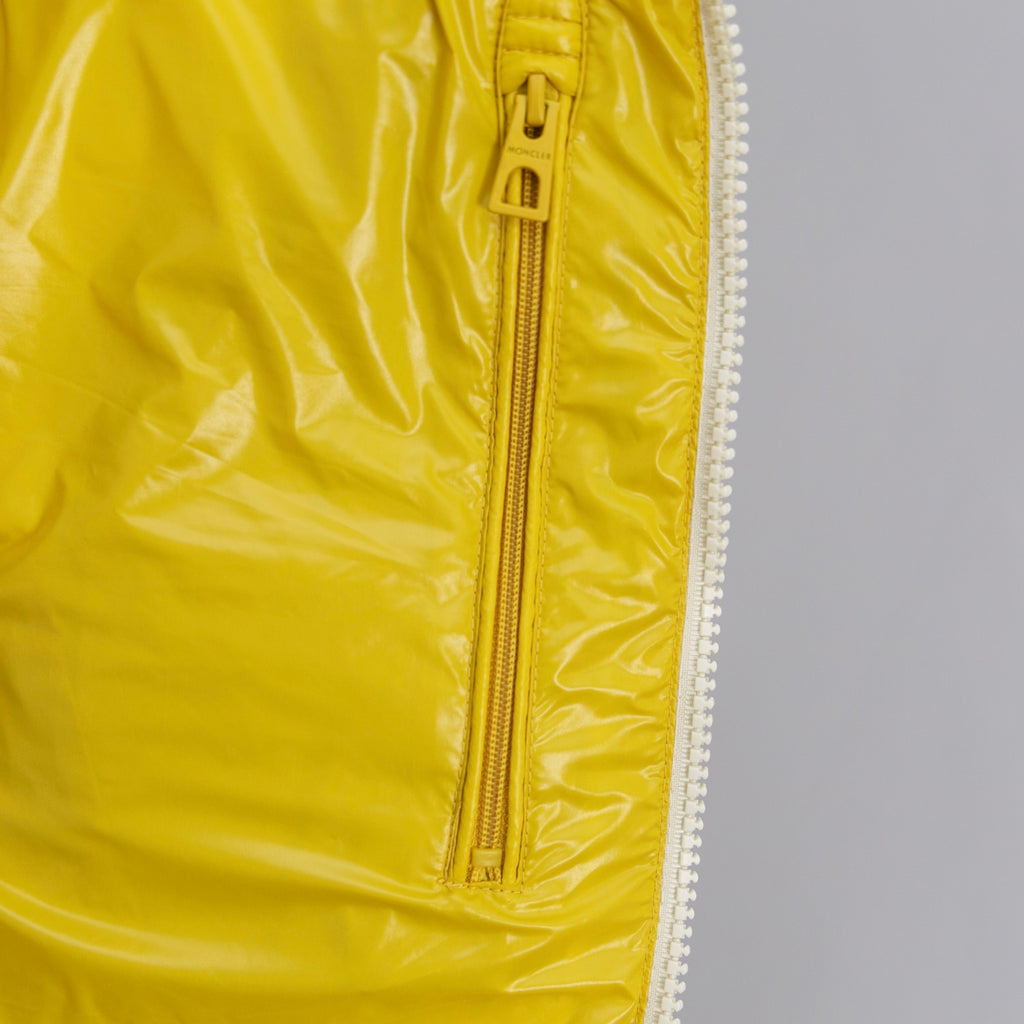 Long puffer coat with front zipper, glossy yellow fabric