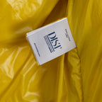 Yellow inner lining fabric with white care/size label card