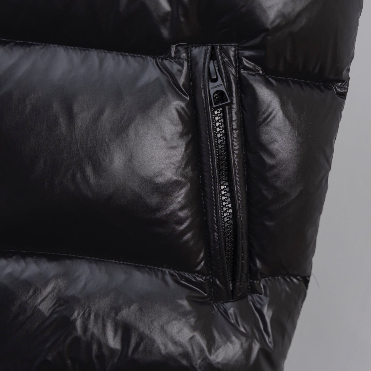 Moncler long puffer coat with stand collar and front zip