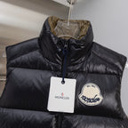Moncler black puffer vest with front zip and embroidered Moncler logo patch