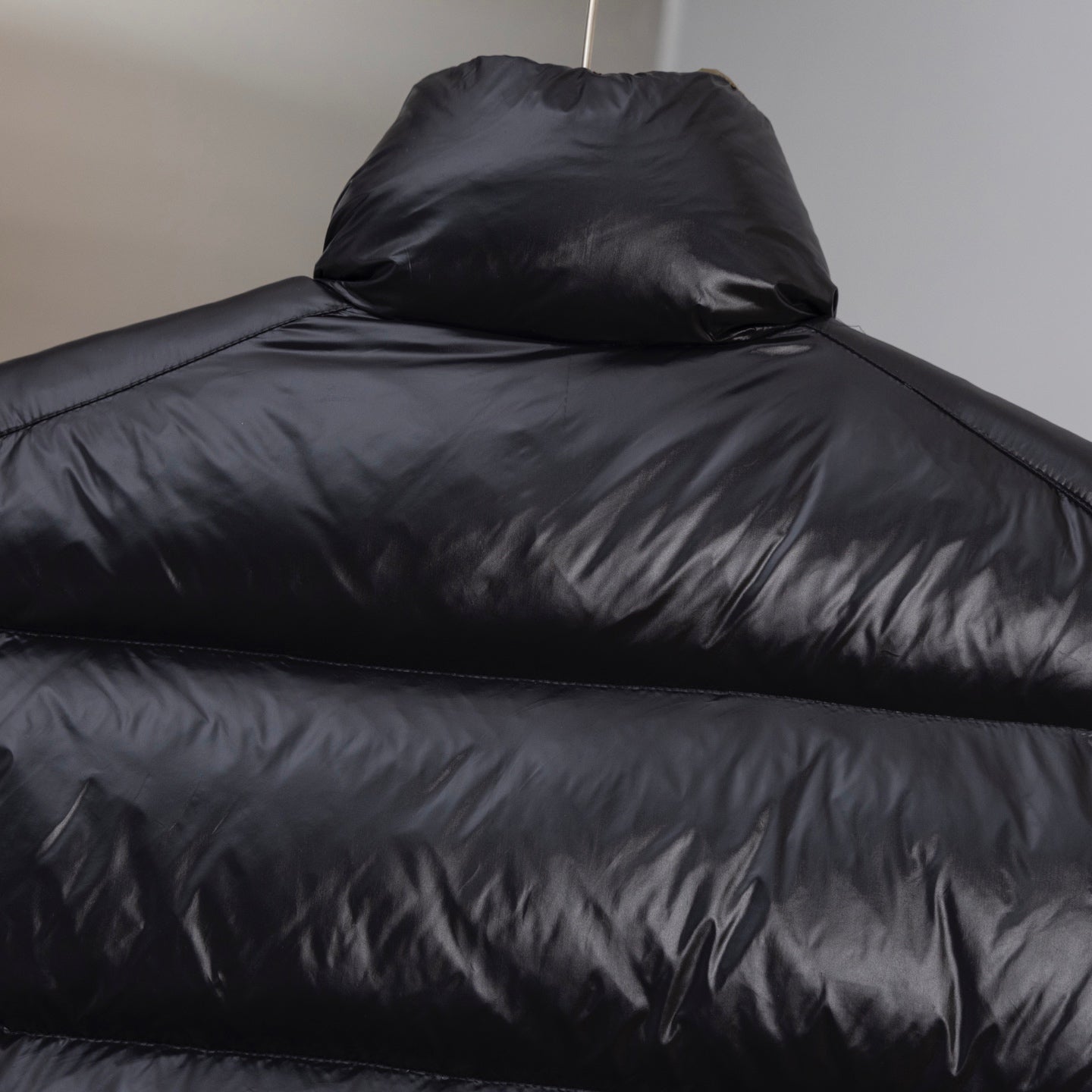 Moncler black puffer vest with quilted shoulder and high collar