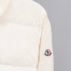 Moncler white puffer jacket sleeve, knit cuff with Moncler logo patch