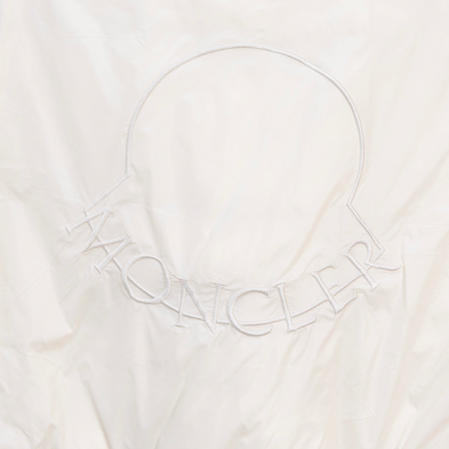 Cream Moncler long puffer jacket with outlined back logo design