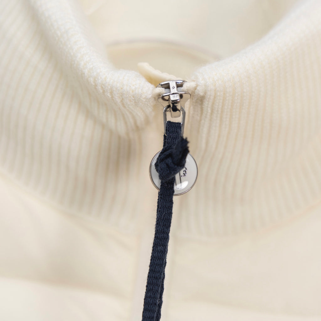 Moncler puffer jacket zipper pull and metal clip on cream stand collar