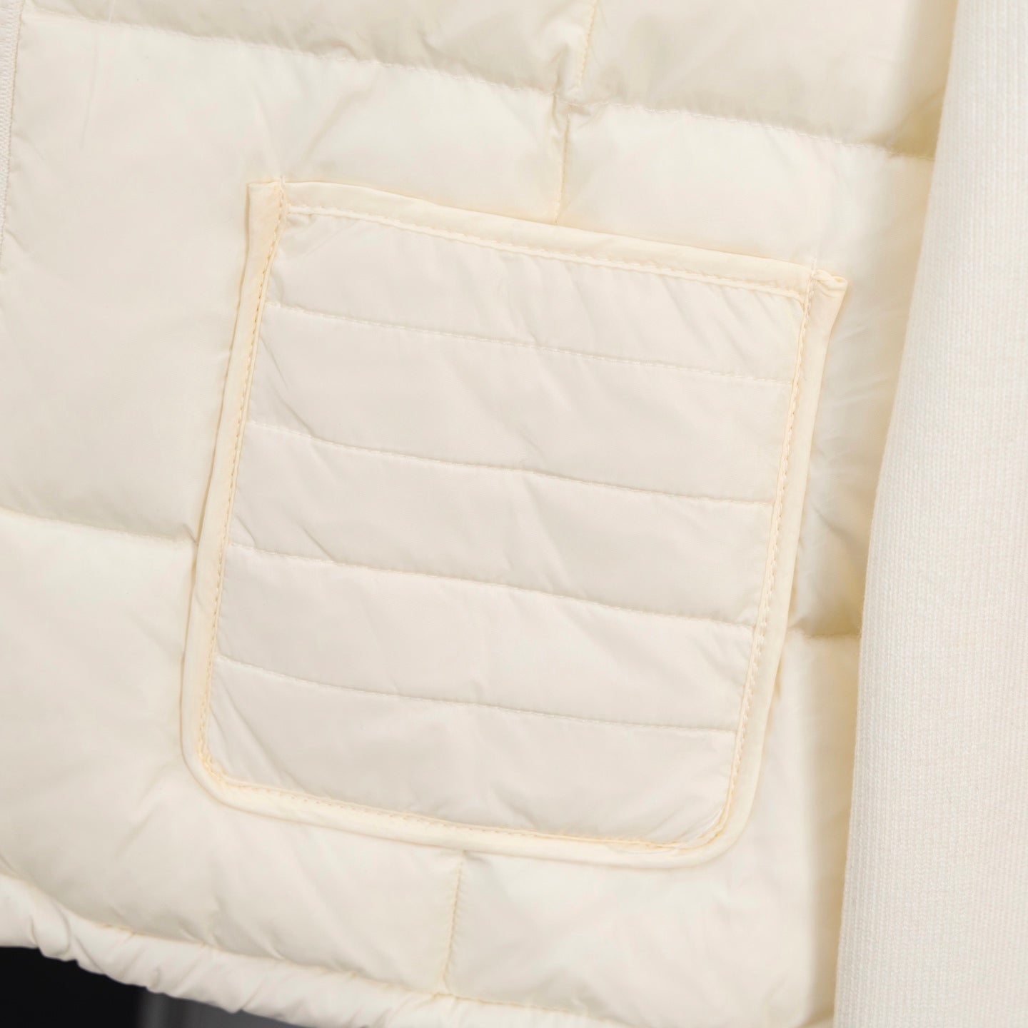 Moncler long puffer jacket, cream, front pocket panel with stitched trim