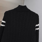 Moncler puffer jacket back with cable knit texture and striped sleeve bands