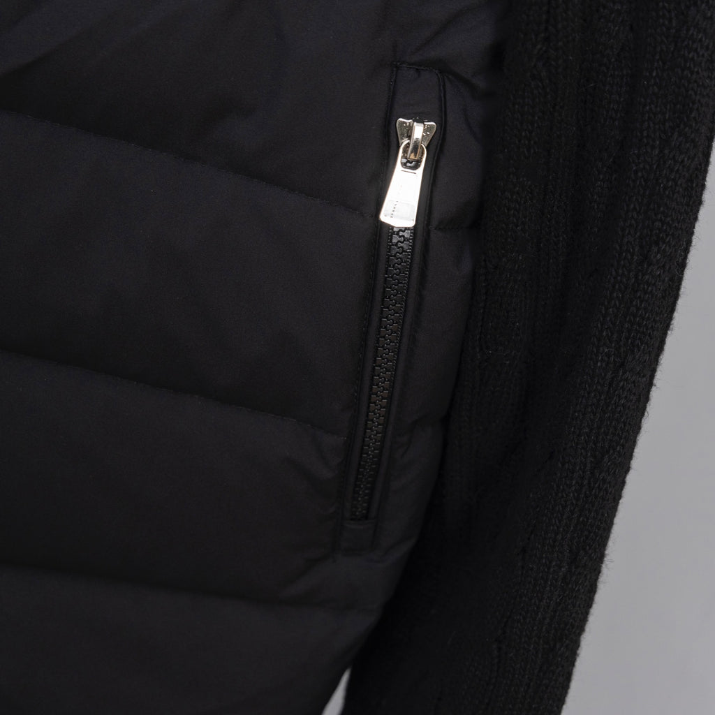 Moncler puffer jacket zipper and quilted panel detail on knit sleeve