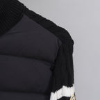 Moncler puffer jacket shoulder and sleeve with black quilted panel detail