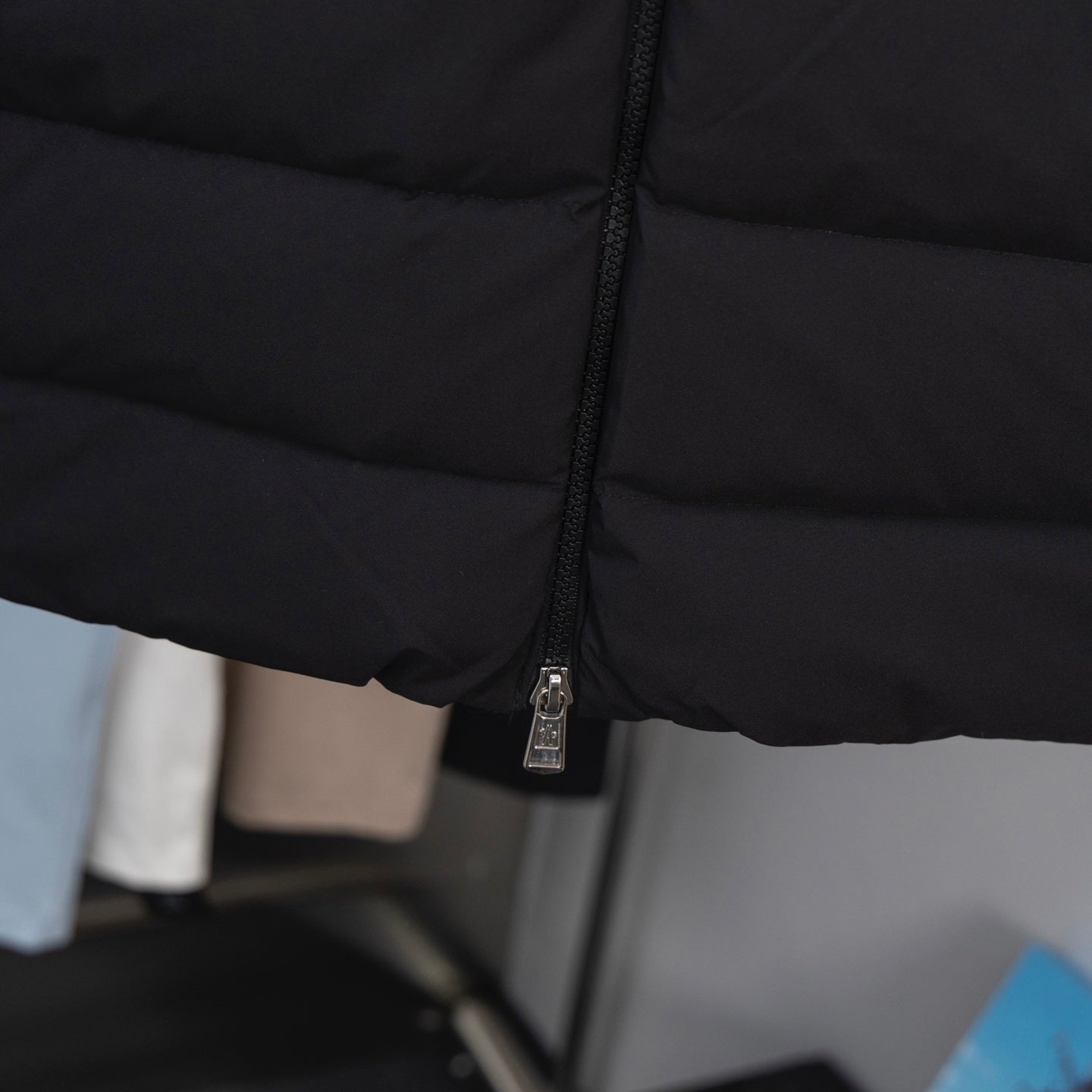 Moncler long down jacket front zipper, dark puffer with metal pull tab