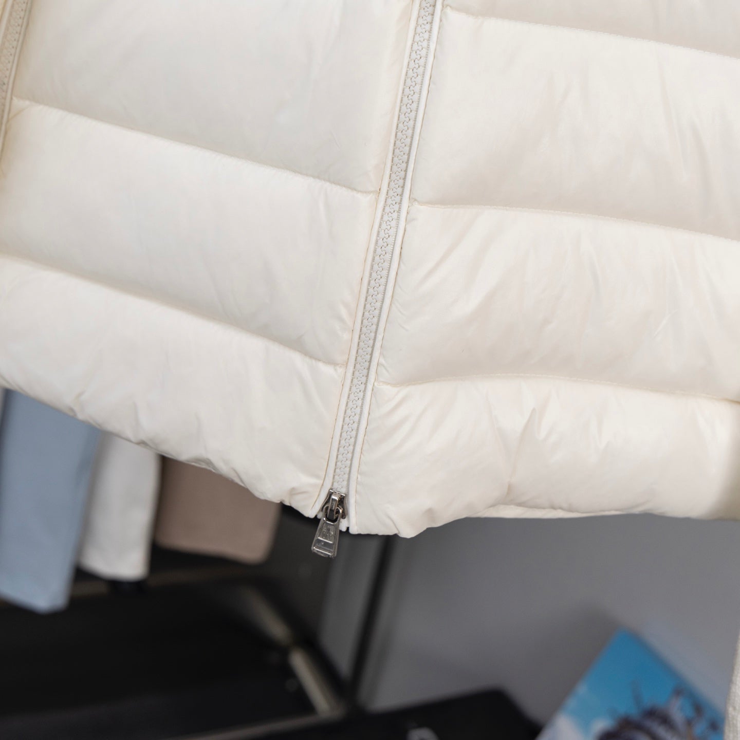 Long white puffer jacket with center front zipper