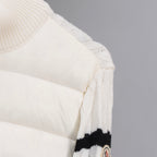 Moncler long puffer jacket side, white puffer quilting and knit sleeve trim