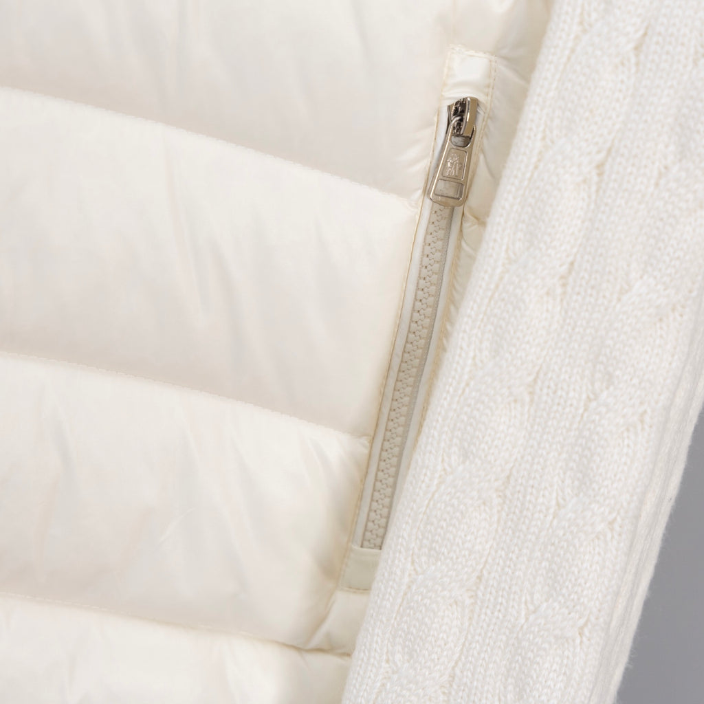 Long white puffer jacket with front zipper and knit cuff