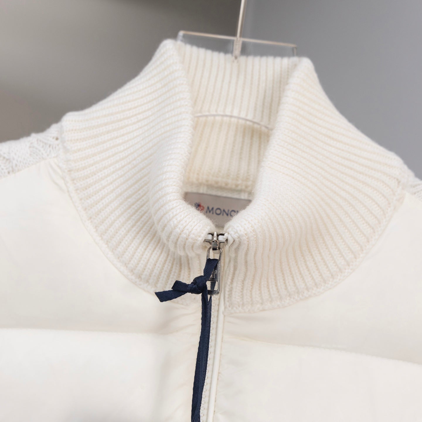 Moncler long puffer jacket, ribbed knit neck and zip with pull tab
