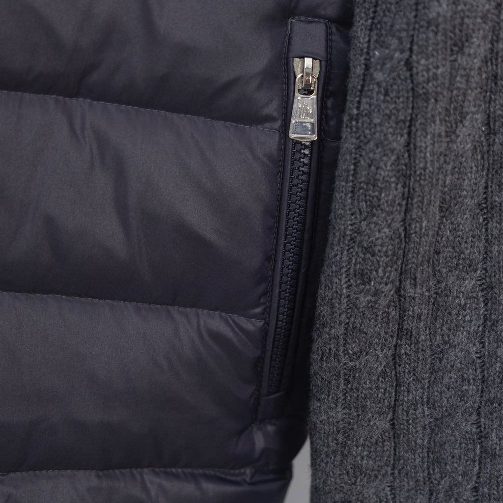 Moncler puffer jacket close-up of front zipper and knit sleeve trim