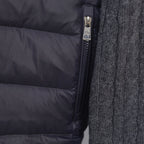 Moncler puffer jacket close-up of front zipper and knit sleeve trim