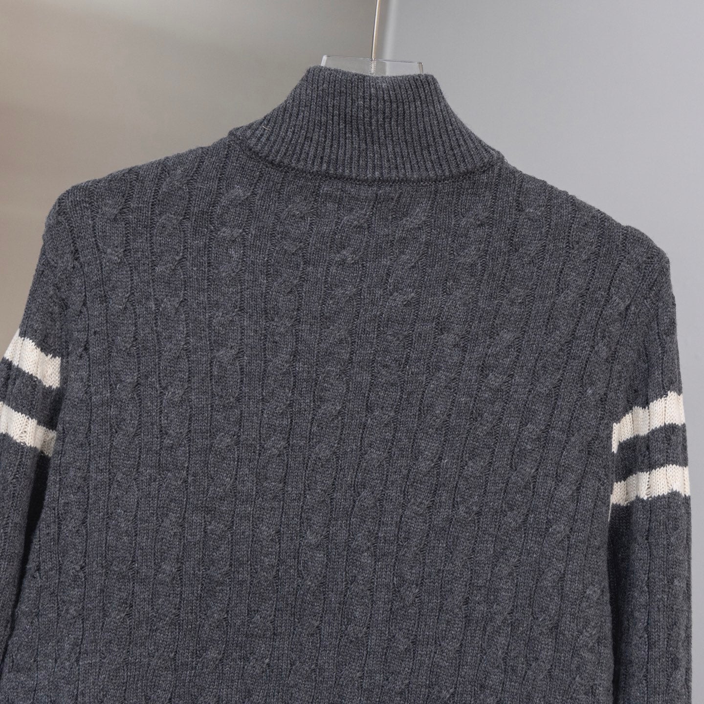 Moncler long puffer jacket back, ribbed turtleneck collar and knit texture