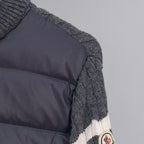 Moncler knit cuff with white stripe on dark puffer side panel