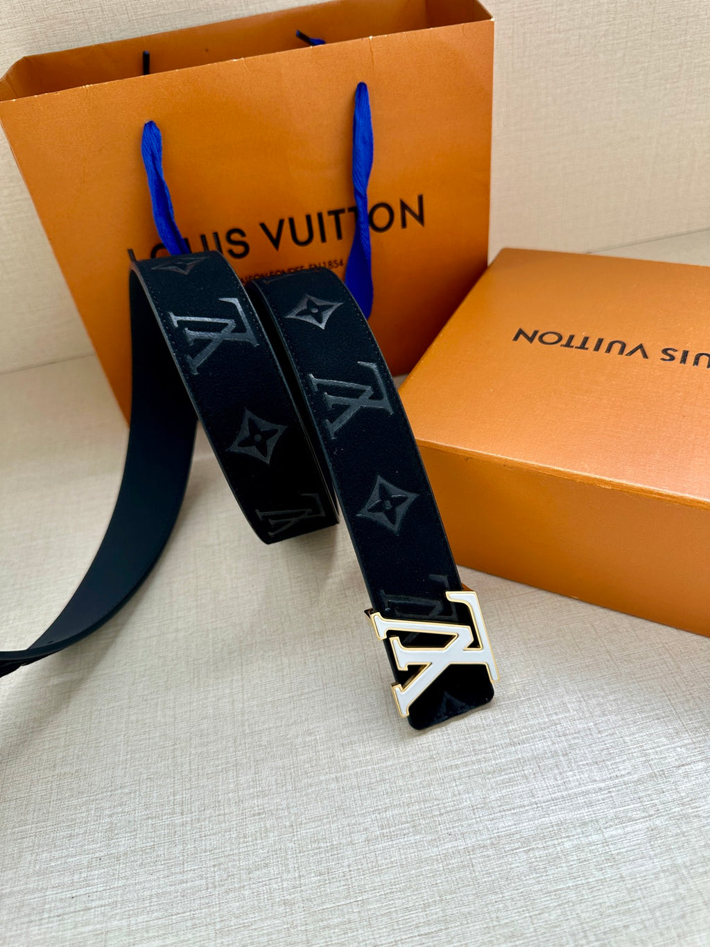 Dark navy wide monogram belt with gold-tone LV buckle