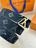 Louis Vuitton belt close-up with monogram embossing and gold-tone buckle