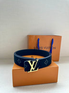 Louis Vuitton dark navy belt with monogram pattern and centered gold-tone LV buckle