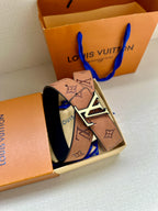 Tan monogram belt with gold LV buckle and matching keeper