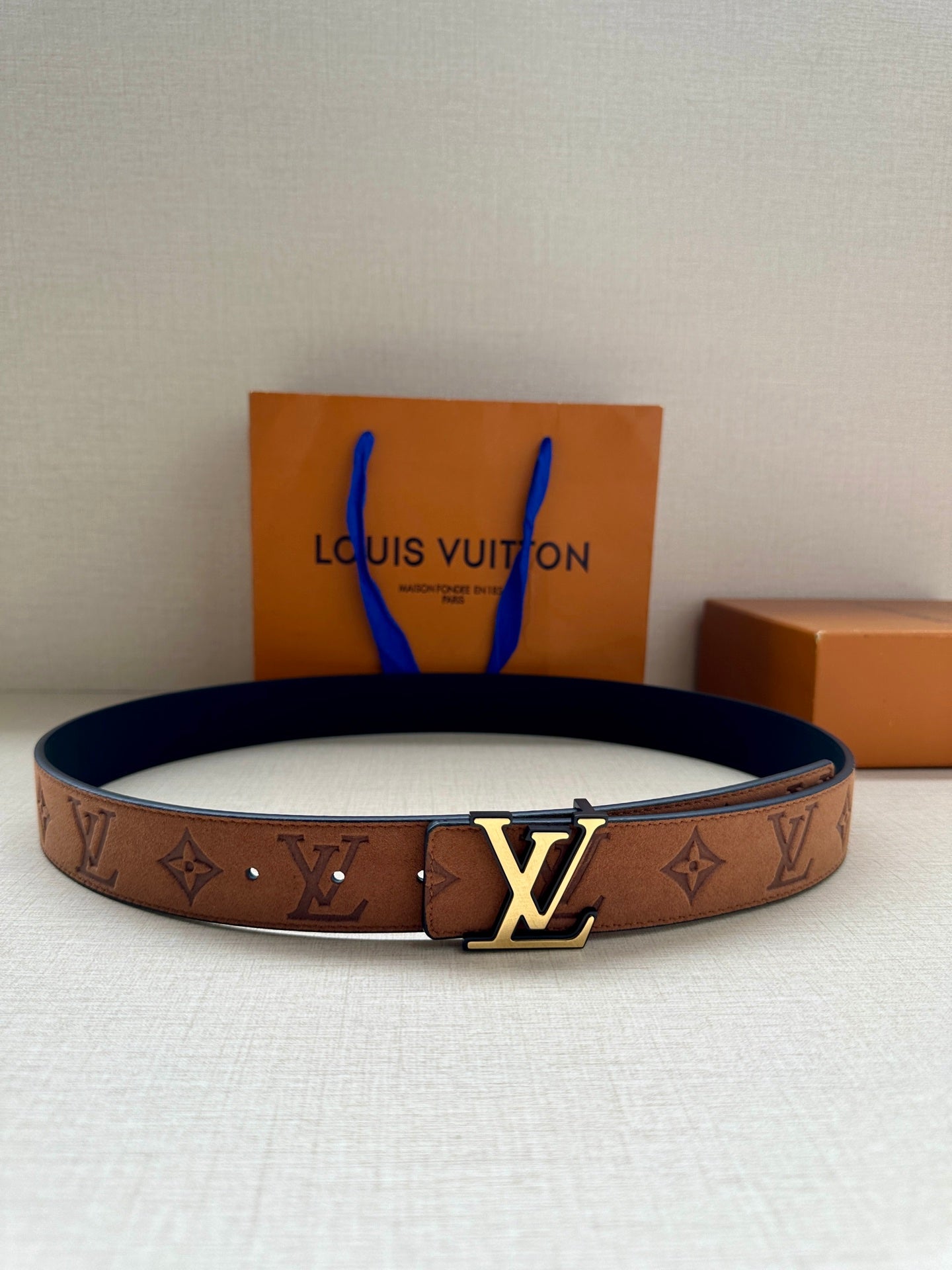 Louis Vuitton belt in tan monogram canvas with gold LV buckle