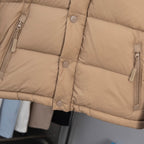 Beige puffer jacket with buttoned front and full-zip pockets