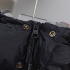 Dark hooded jacket collar with snap buttons and Burberry logo patch