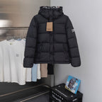 Burberry hooded long puffer jacket in black, full front buttons and zip closure