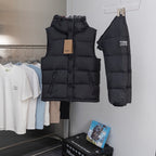 Hooded long puffer jacket in black, front view with matching hooded back piece