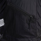 Dark jacket lining with mesh pocket and zip closure