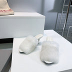 Balenciaga white faux fur slide sandals with low heel and thick fuzzy strap