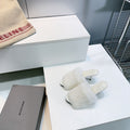 Balenciaga white faux fur slide sandals with low stiletto heel and open toe