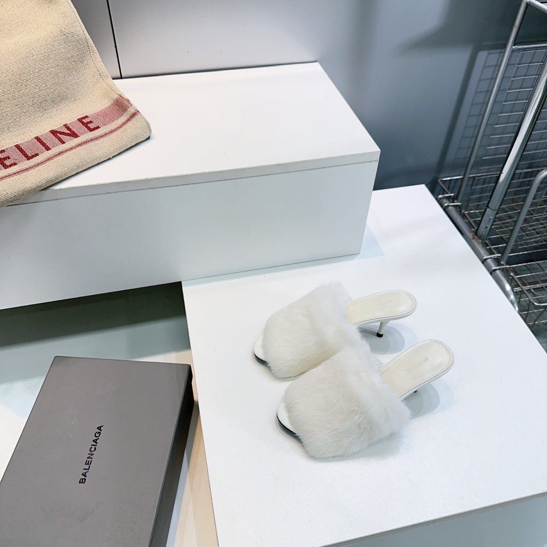 Balenciaga white faux fur slide sandals with low stiletto heel and open toe
