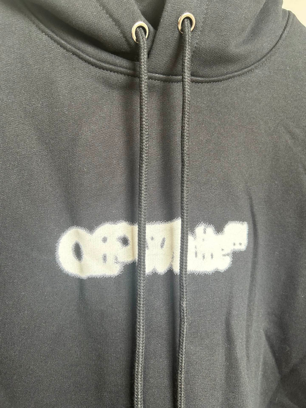 Off White hoodie hood with white logo print and gray drawstrings