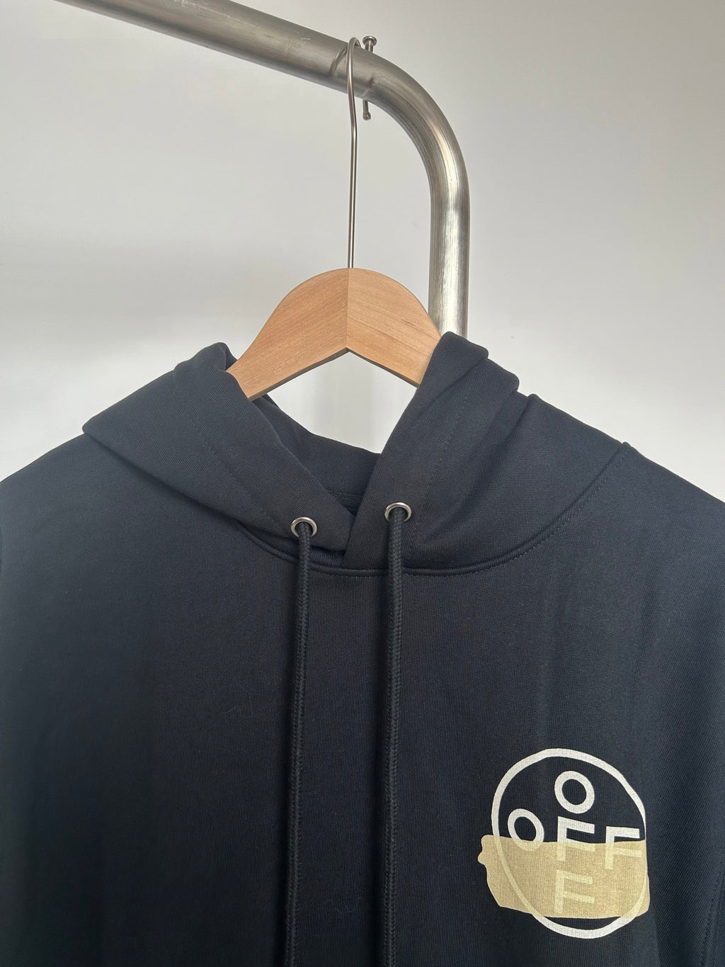 Off-White navy hoodie chest logo patch, drawstring hood, front kangaroo pocket