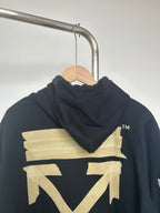 Dark navy zip-up hoodie with off-white chest logo graphic and hood with drawstrings.