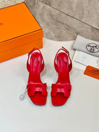 Hermes red open-toe high-heel slingback sandals, outsole and heel view