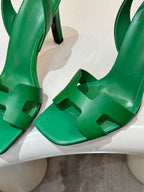 Green leather open-toe high-heel sandal with crisscross strap details