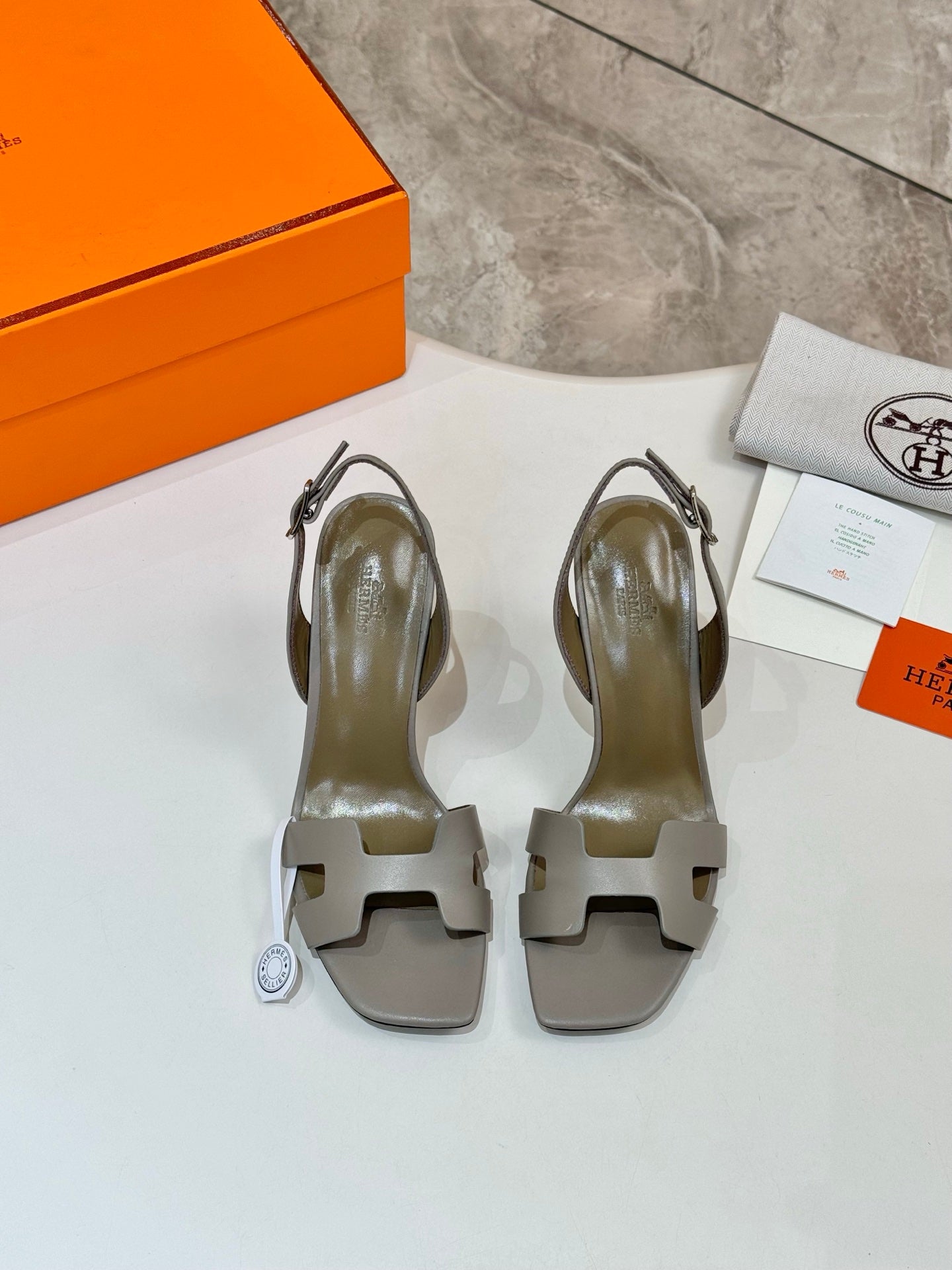 Hermes heeled sandals, light gray leather, with cutout strap and block heel
